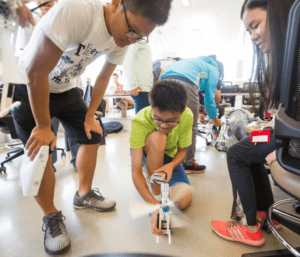 ACE students play with gadget at Wisconsin Institutes of Discovery