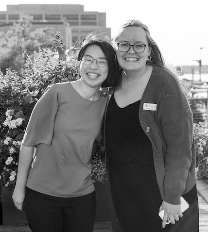 Yu-Li Wang and UW–Madison Enrollment Coach Kayla Schween pose together outdoors 