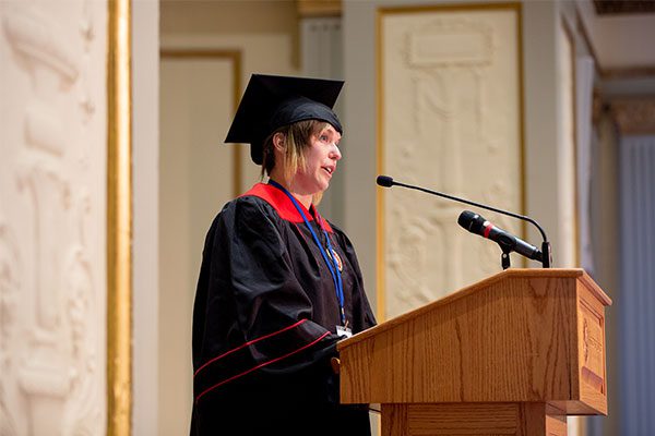 Kilmer, a student, giving a graduation speech