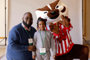 Otis Harris and Penelope with Bucky Badger