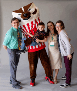 Amanda Sauri and guests with Bucky Badger