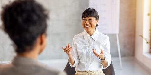 Two people taking part in a motivational interview
