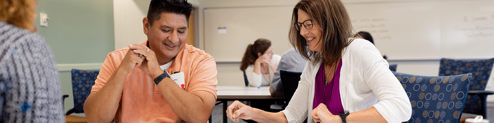 Smiling students in Leadership course