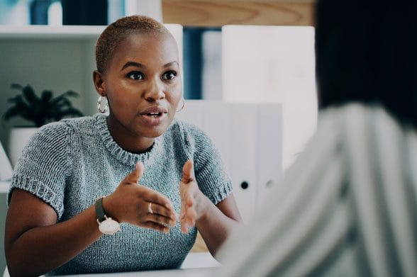 Counselor speaking with client